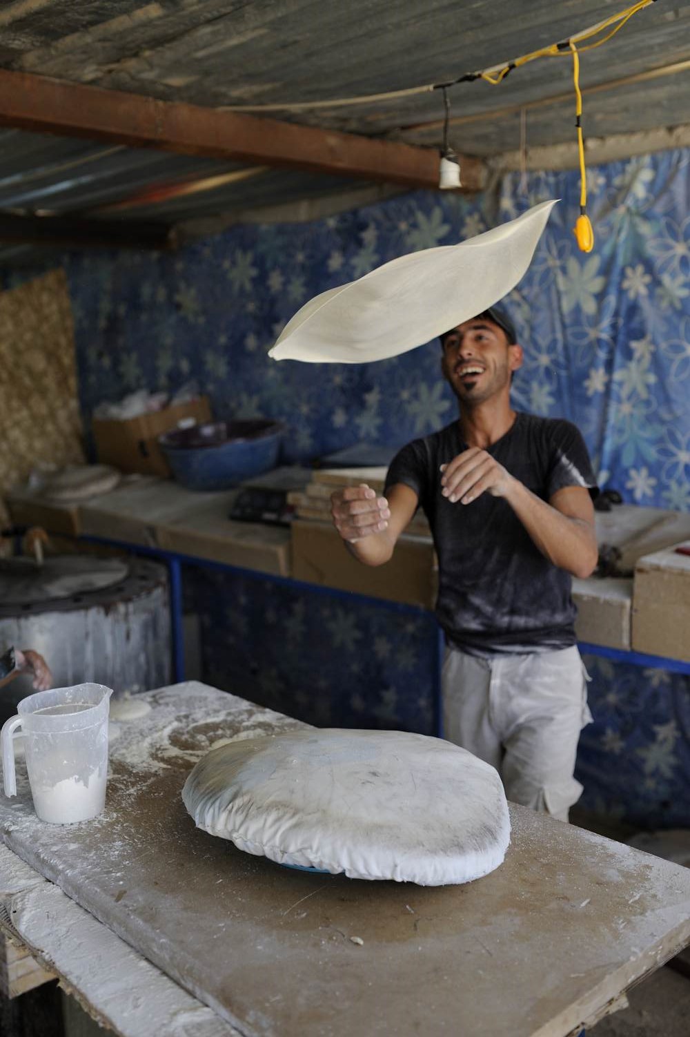  Bread is distributed daily by the UNHCR in Za'atari camp; yet the Syrians prefer their own fresh bread. 