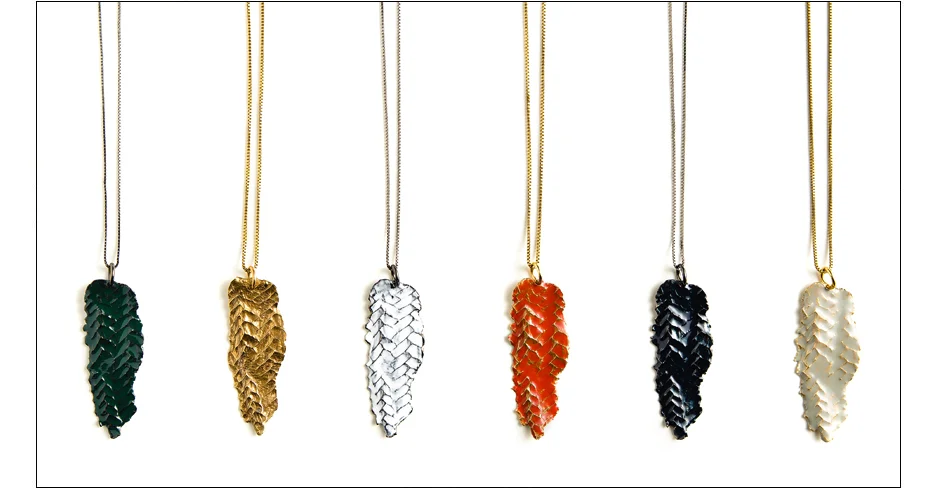 augustus pendants / rope imprinted brass with enamel wash on chain inquire about availability 
