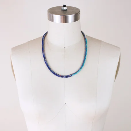 Genni-Necklace-man.jpg