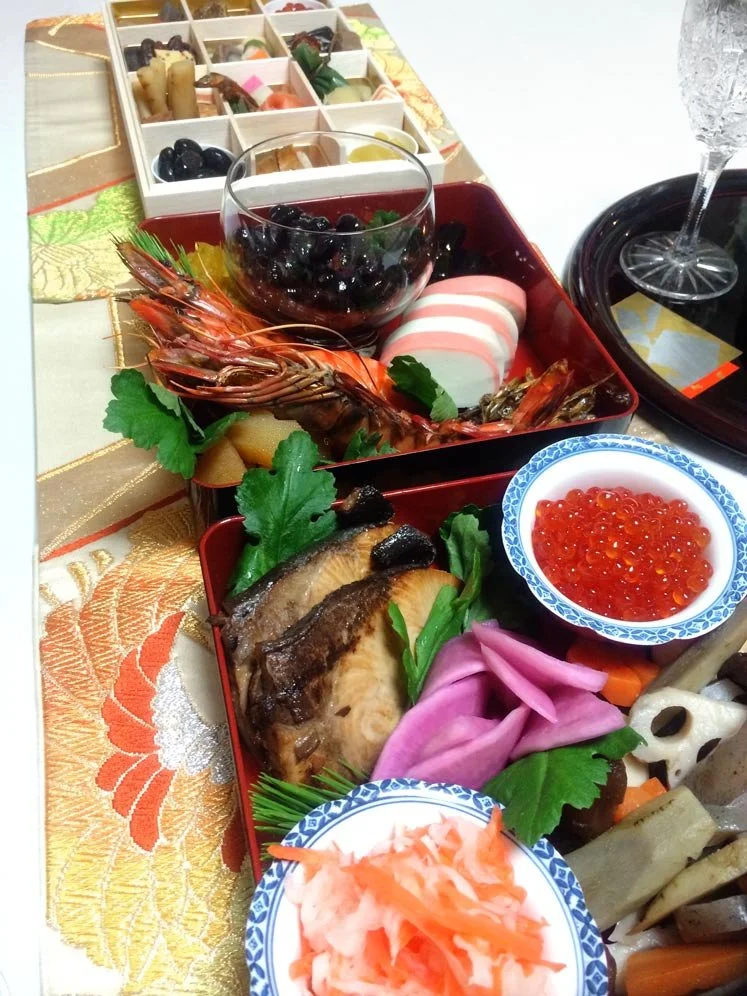 Osechi lacquer boxes arranged for Oshōgatsu in a traditional Japanese home