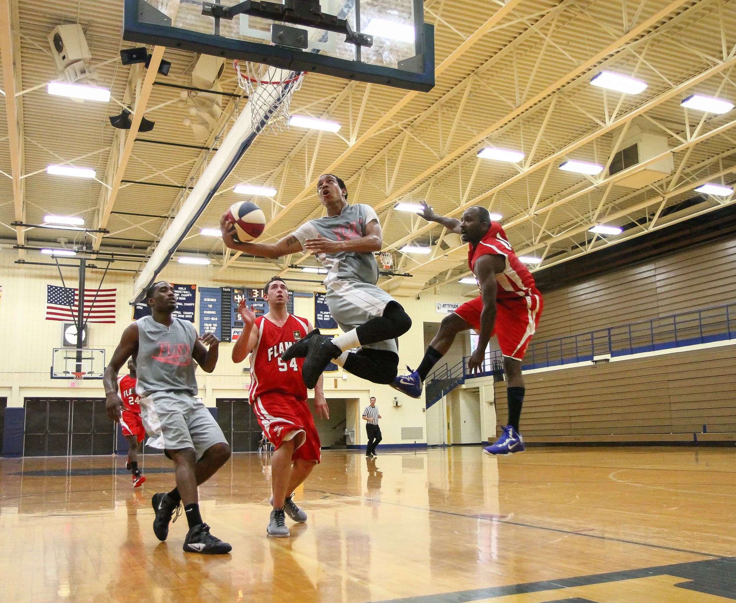 A Chicago Fury player attempts to score against the Midwest Flames.