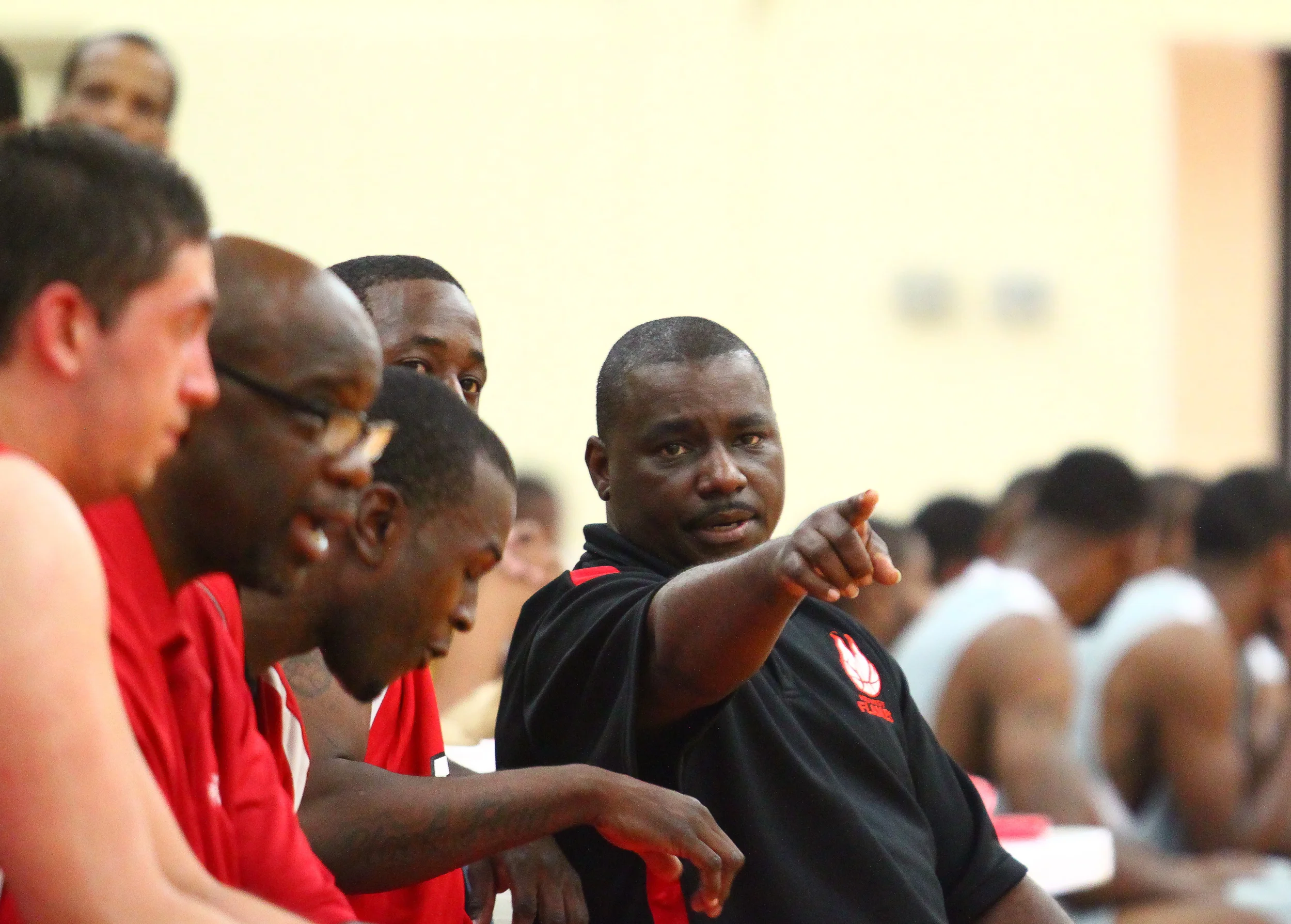 Midwest Flames coach Quinton Johnson talks with one of his players during the game between The Midwest Flames vs Chicago Fury 