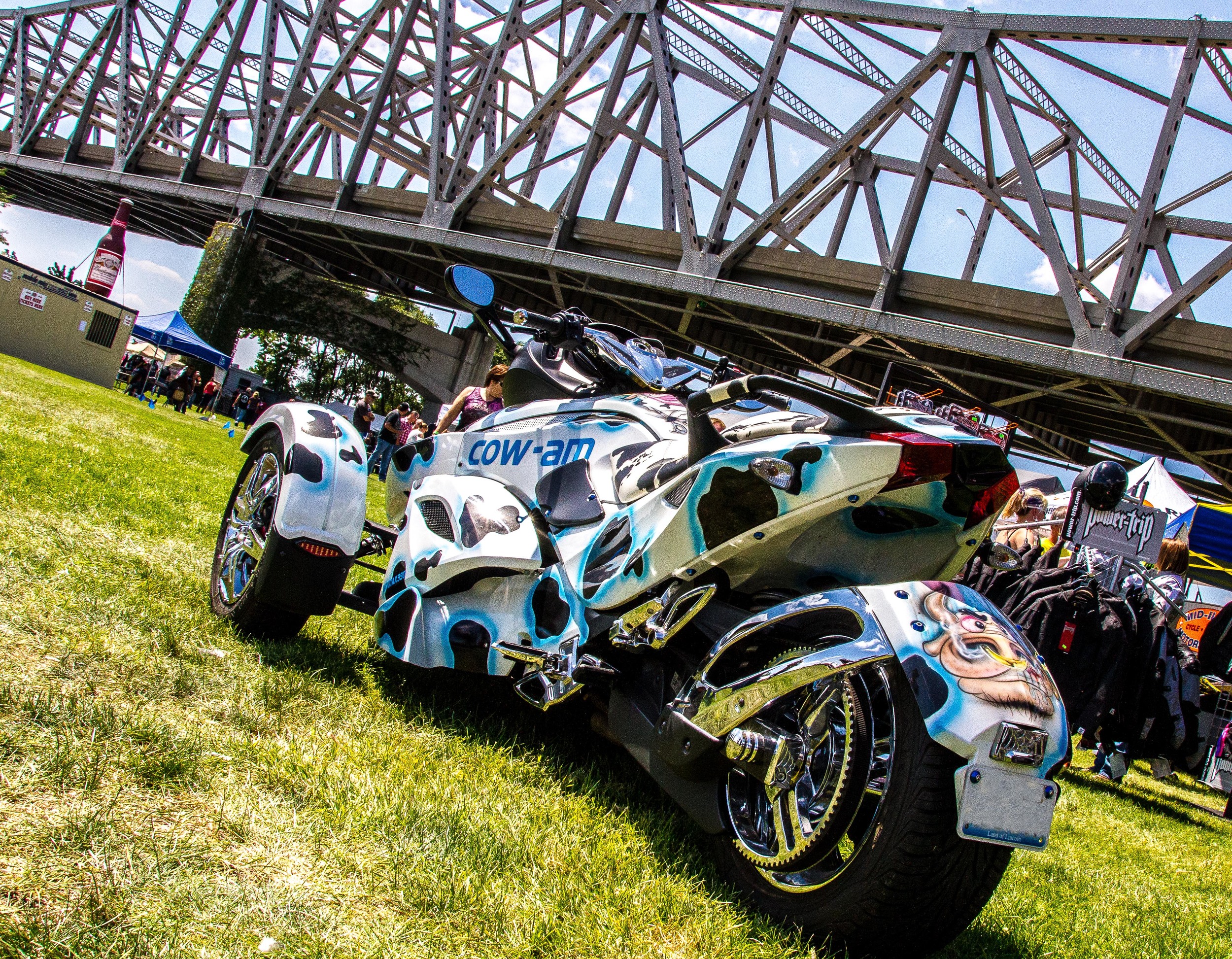 A Can-Am named "Cow-Am" sits out side the Extreme Kempy Booth at the Peoria Grand Nationals Bike Rally in Peoria, IL