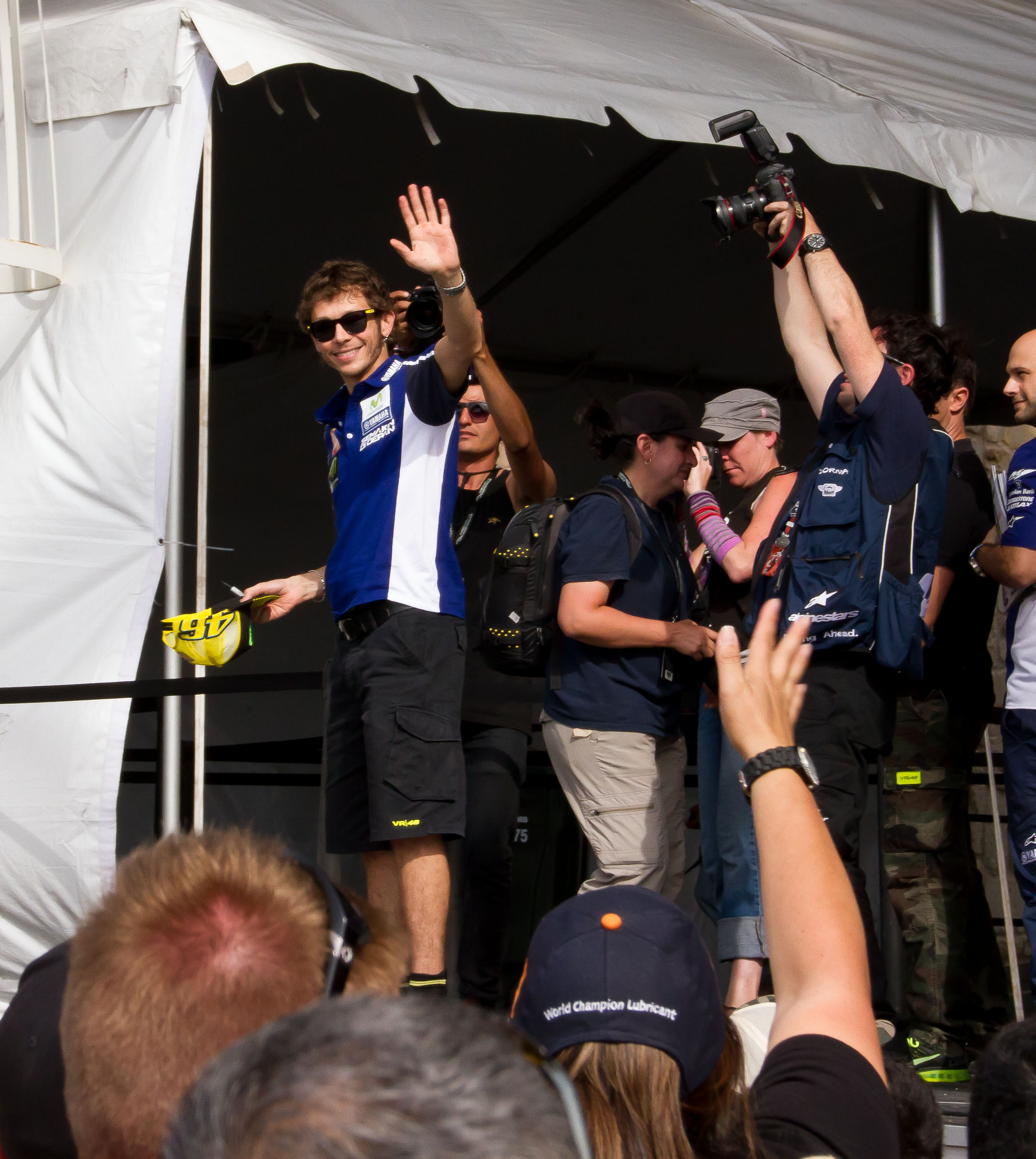 MotoGP fan favorite Valention Rossi waves to the crowd.