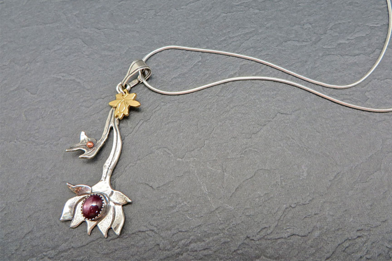 Star-Ruby-Lotus-Flower-Necklace-Custom-Jewelry-1.jpg
