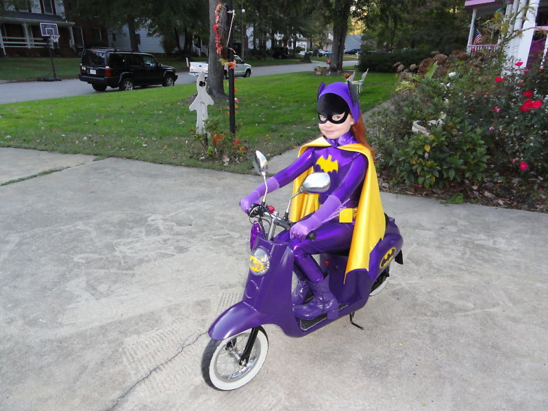 mini-batgirl-cosplay-complete-with-mini-batcycle-header.jpg