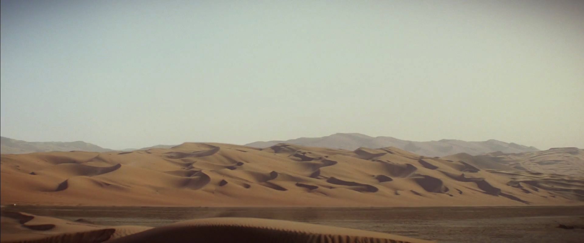 Introducing a new dessert planet named Jakku. Rey ( Daisy Ridley ) on a speeder.