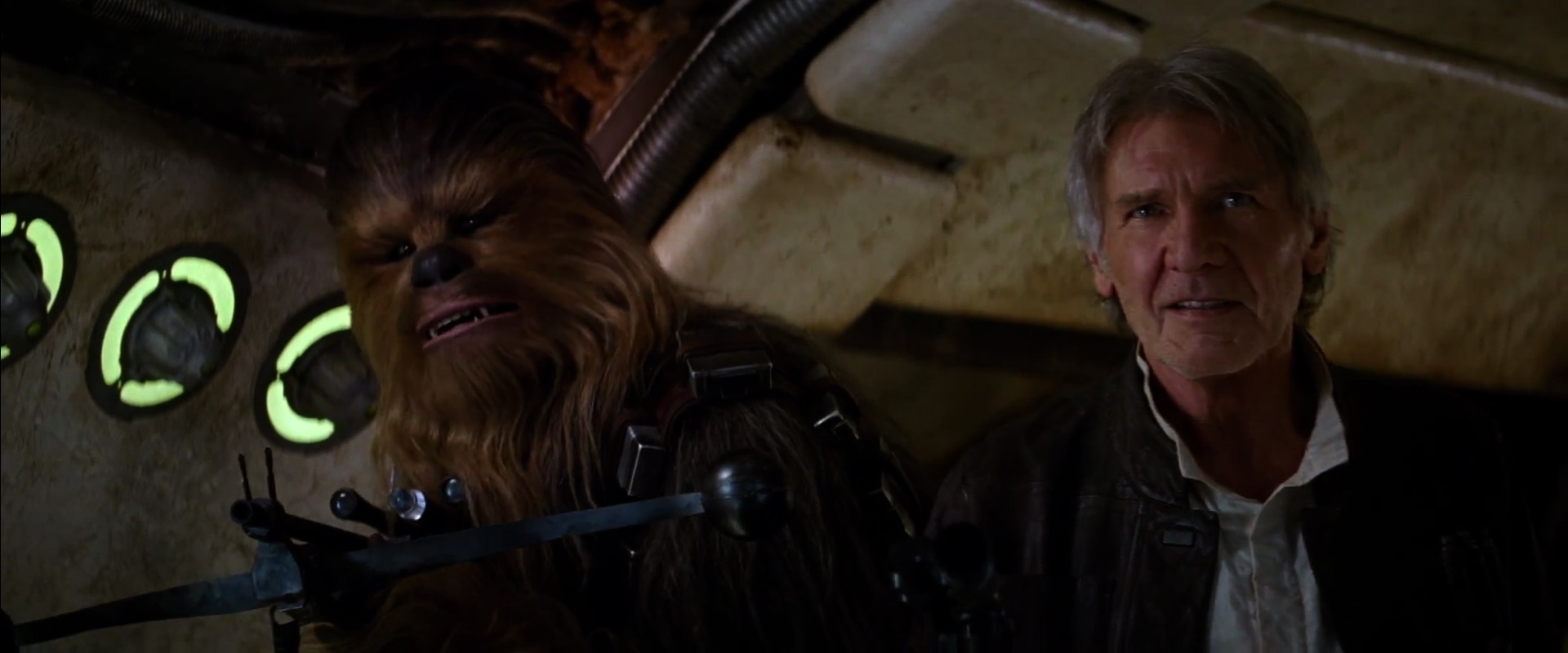 "Chewie, we're home" and very clearly on the Millennium Falcon. Whats interesting that that they have their weapons raised.