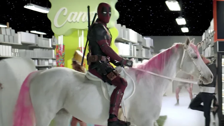 Deadpool Inflatable Deadpool Rides a Unicorn in Bizarre New Promo and 3 New International ...