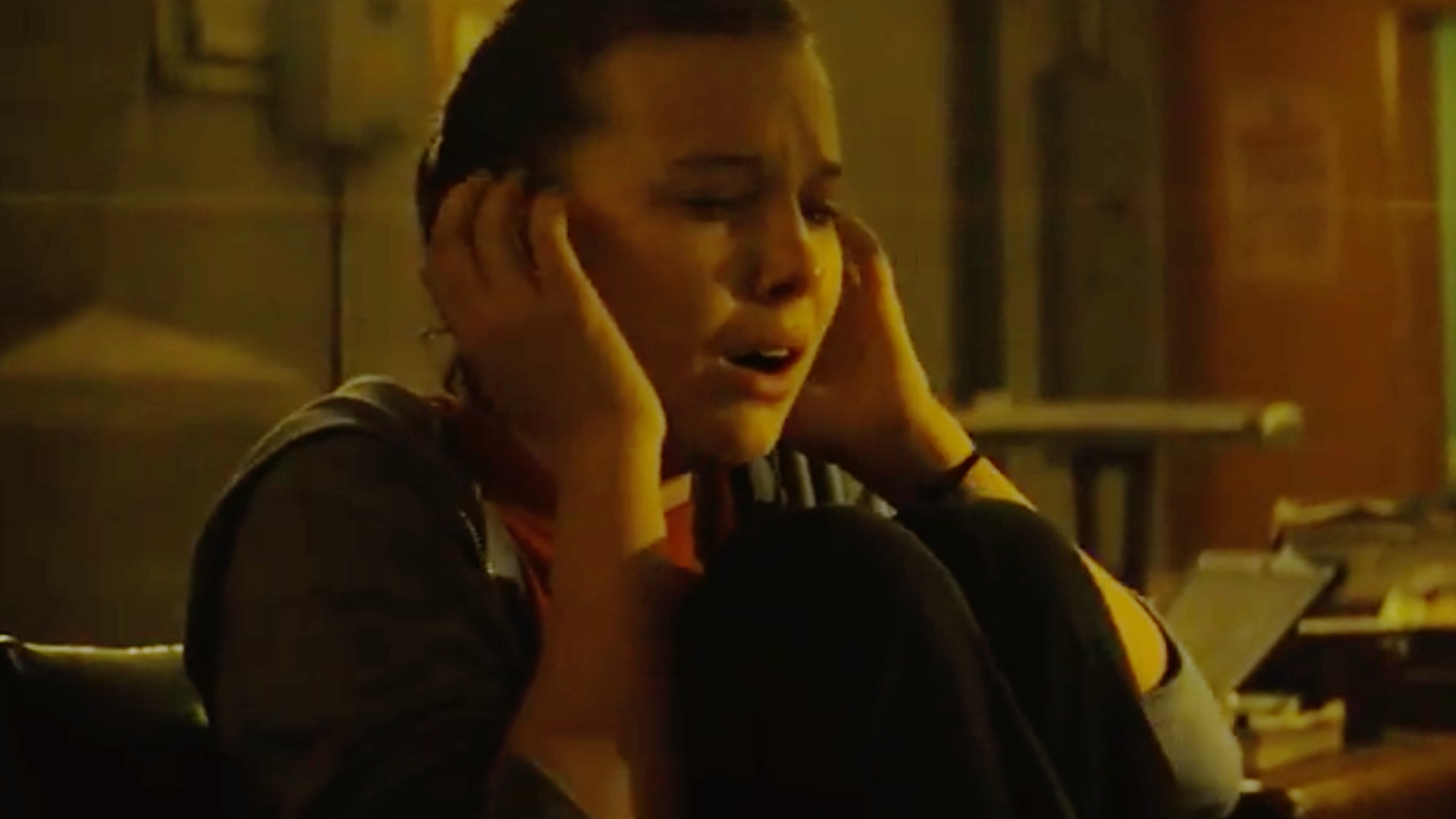 first-teaser-for-godzilla-king-of-the-monsters-features-millie-bobby-brown-trying-to-reach-monarch-social.jpg