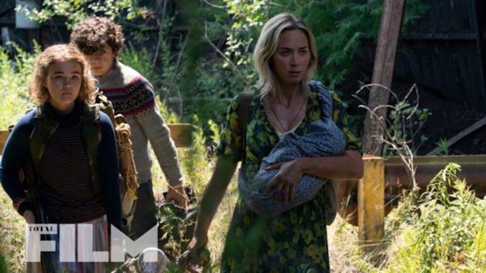 first-photo-from-a-quiet-place-2-features-emily-blunt-in-survival-mode-with-her-family-social.jpg