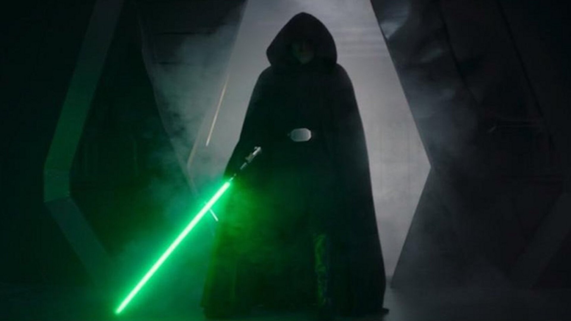 Who could that black-hooded guy be with the green lightsaber?