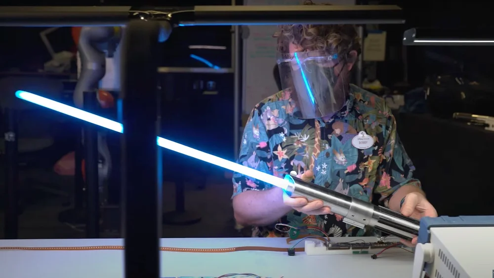 new-footage-of-disneys-real-life-lightsaber-featured-in-imagineering-innovation-showcase-promo.jpg