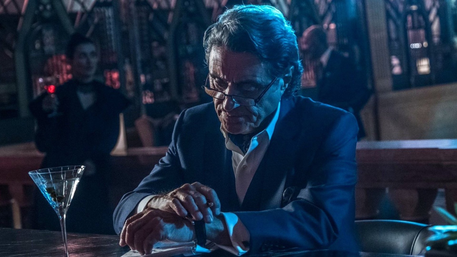 Ian McShane Offers New Insights into BALLERINA and Winston’s Knowledge of Ana de Armas’ Character, “Baby Yaga”