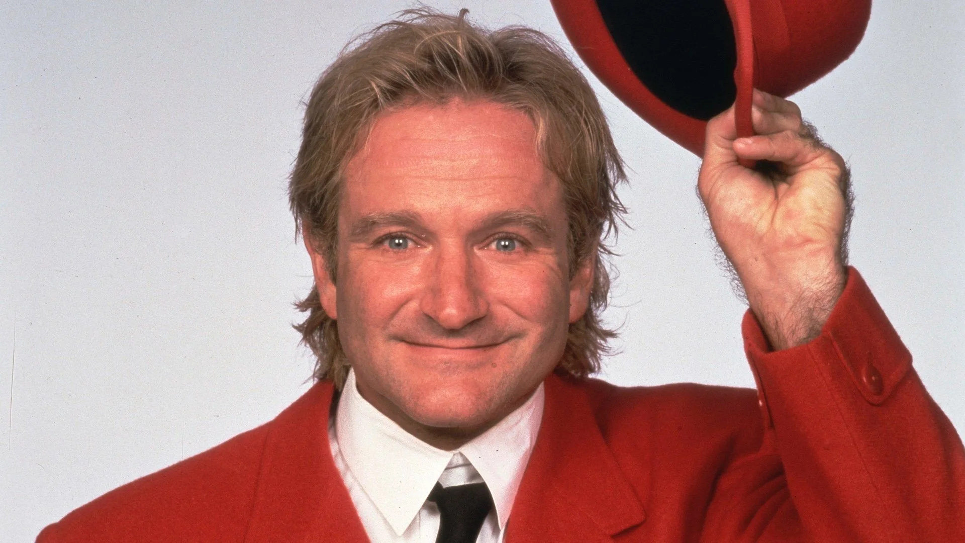 The BATMAN FOREVER writer recalls his conversation with Robin Williams about playing the Riddler