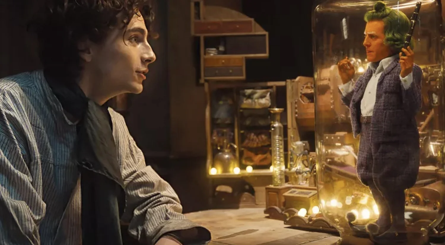 New WONKA Photos Feature Hugh Grant as an Oompa Loompa and Timothée