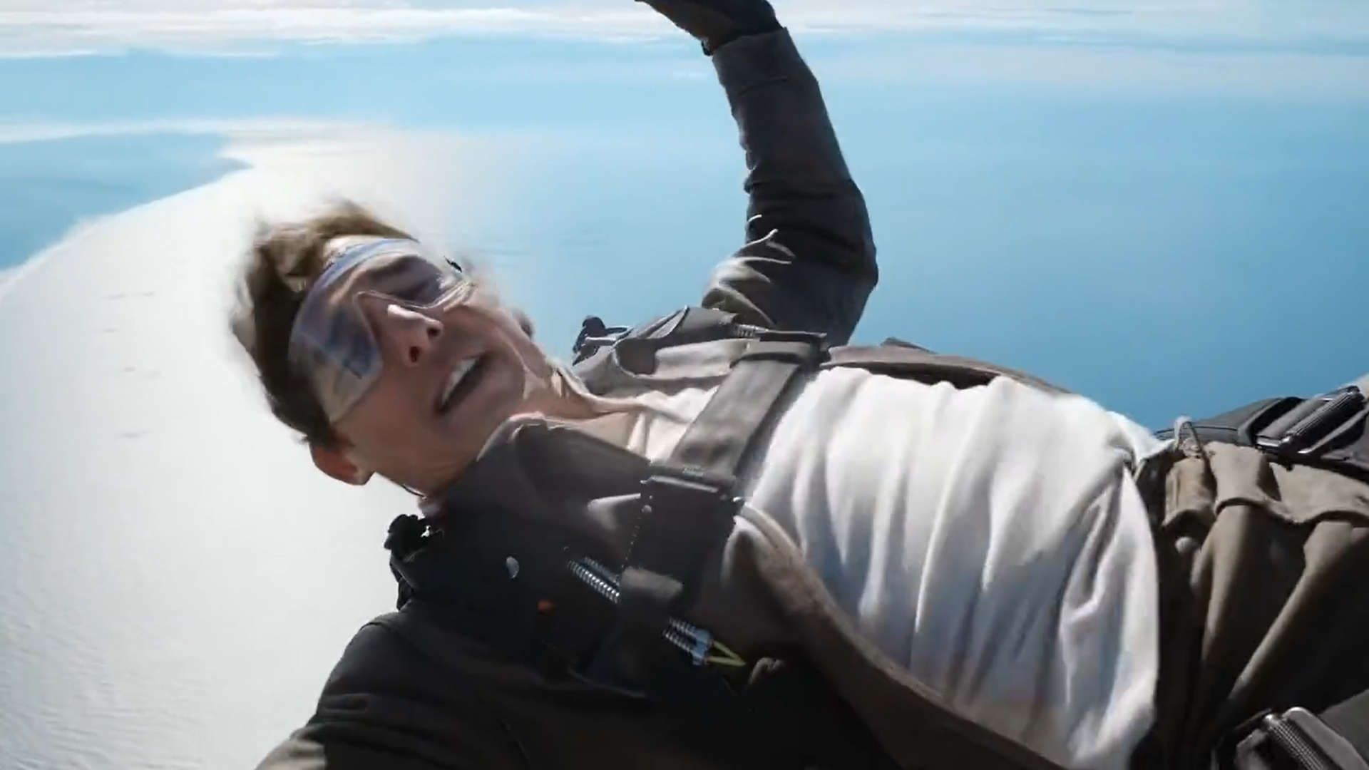 Tom Cruise Jumps Out Of Plane For MISSION IMPOSSIBLE: DEAD RECKONING Stunt And Shout Out To TOP GUN Fans