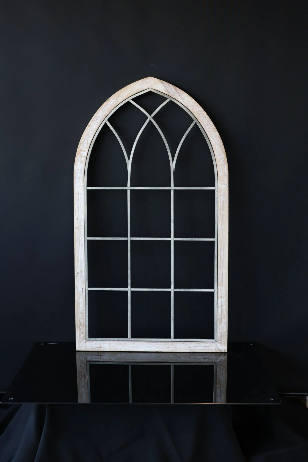 White and Silver Arch Window