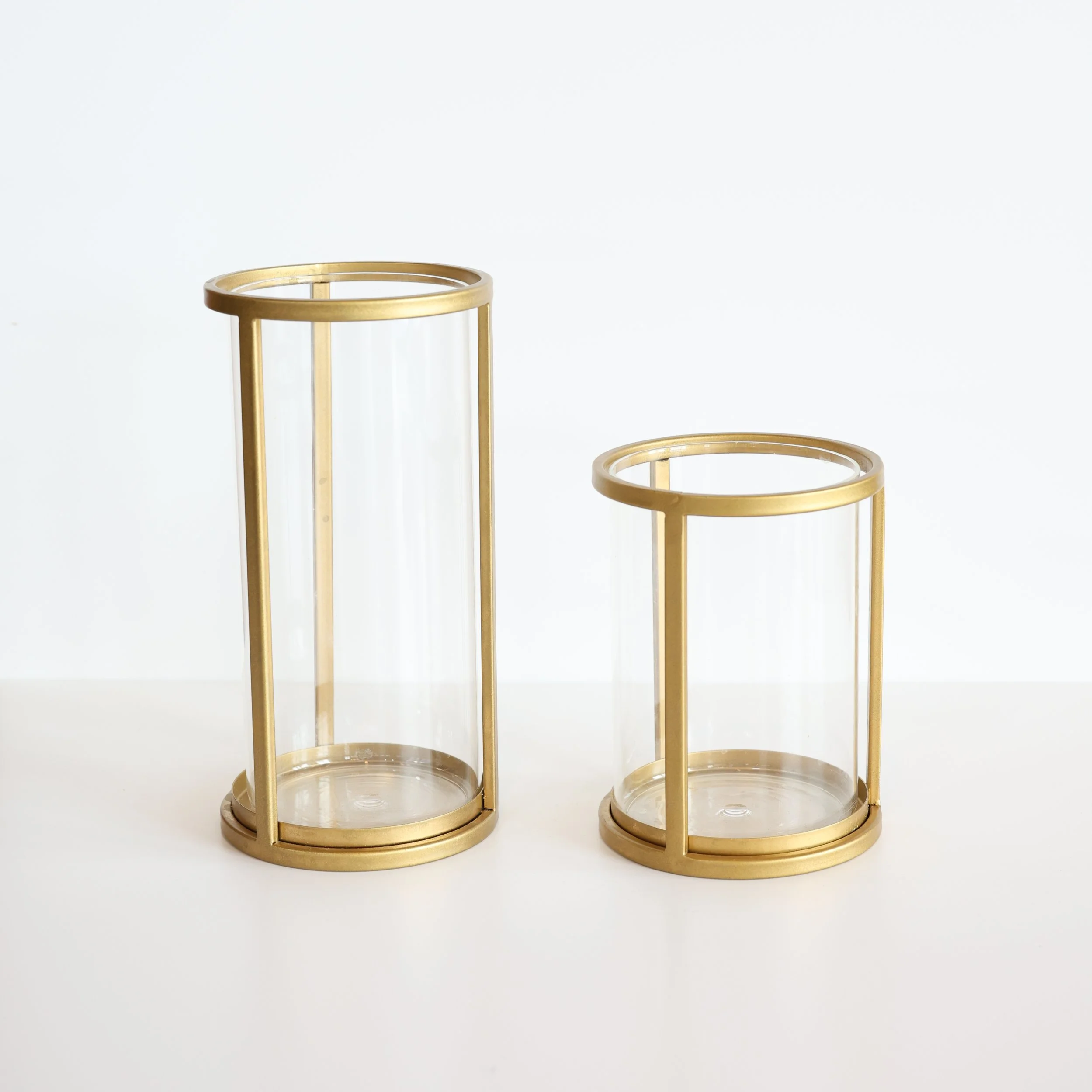 Glass cylinder with bronze cage