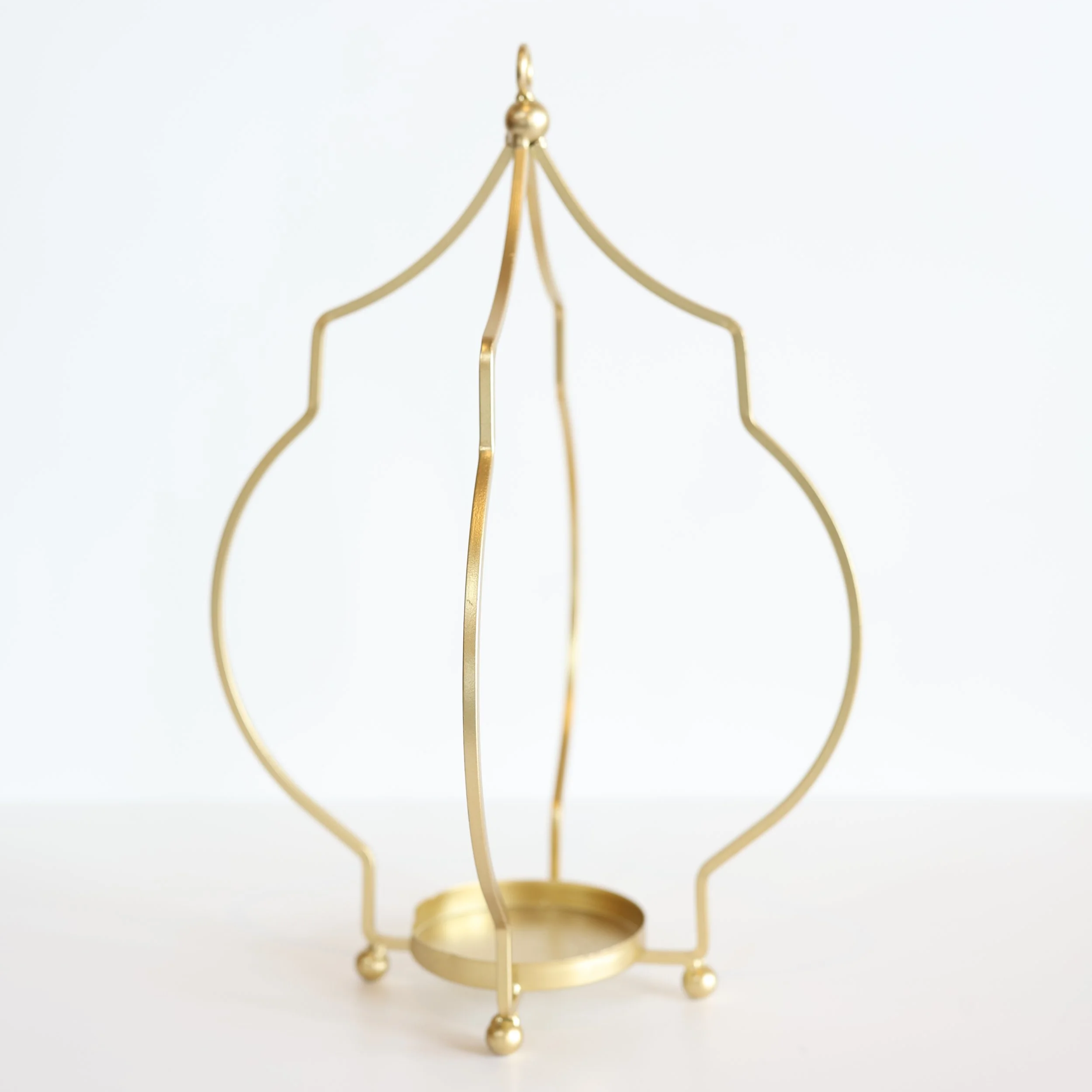 Curved Gold Lanterns