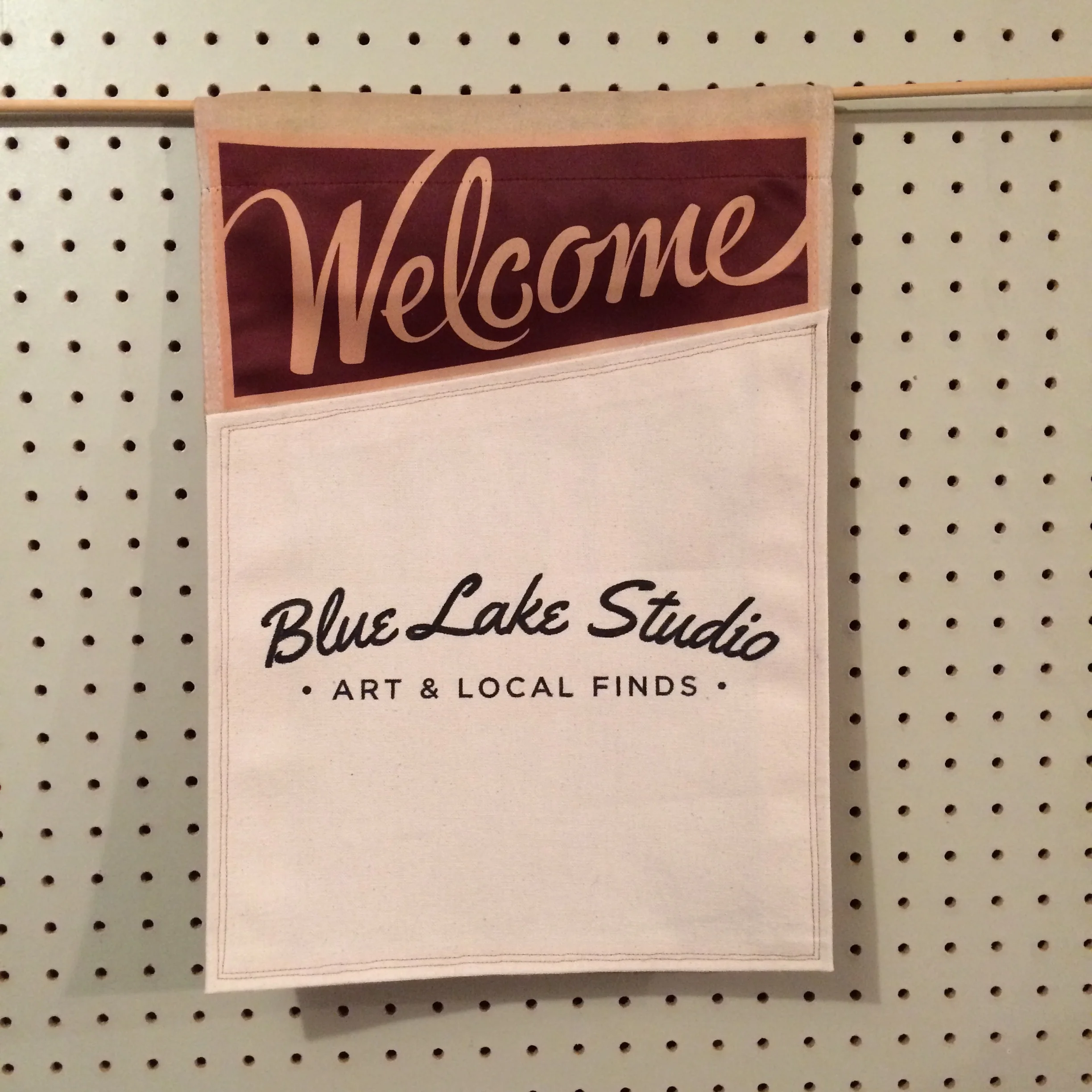 I created the logo for Blue Lake Studio and made some banners to hang outside their business.