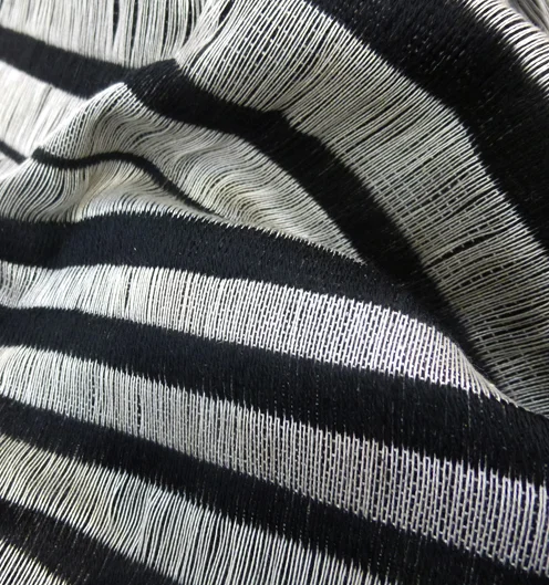 Silk with wool, hand woven on a Texel dobby loom