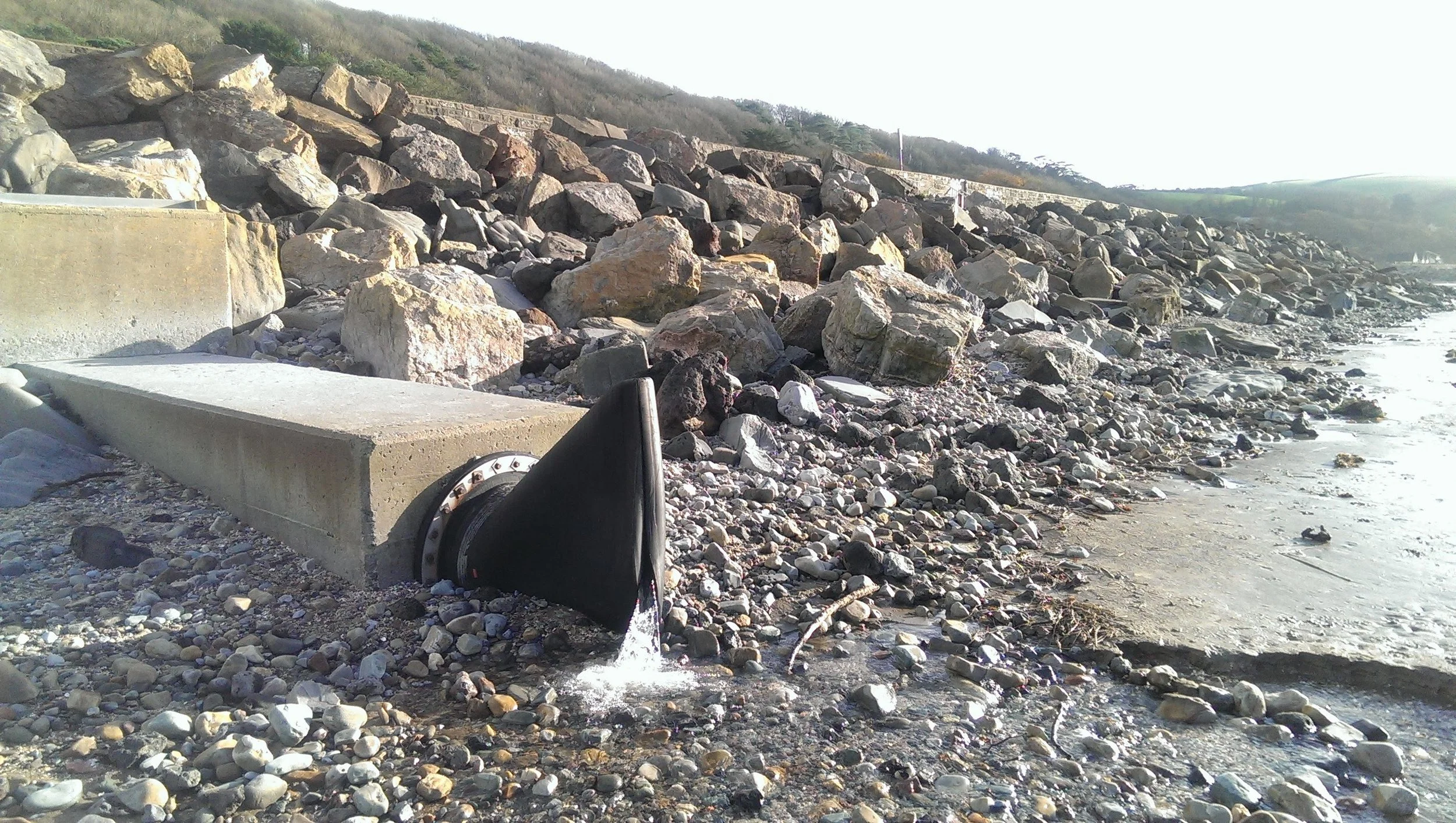 10 year old Tideflex DN600 discharging whilst half buried.
