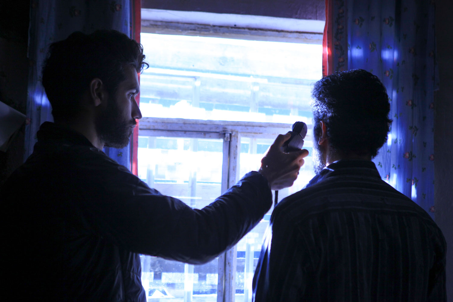Lighting a night scene on the set of Mardan.
