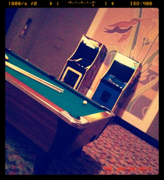 Ms. Pacman, Galaga, and Pool Tables at a Corporate Networking Event.