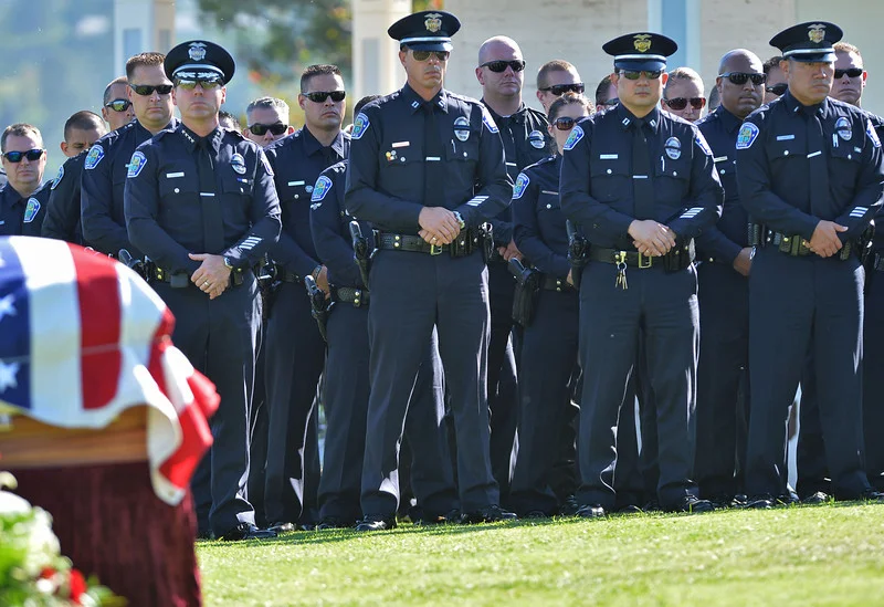  Rancho Palos Verdes, CA --Daily Breeze Staff Photo: Robert Casillas / LANG --- Funeral service for Hawthorne Police Sgt. Leonard Luna at Green Hills Memorial Park in Rancho Palos Verdes.