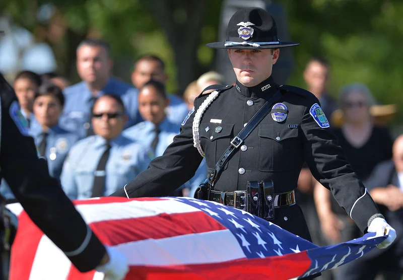  Rancho Palos Verdes, CA --Daily Breeze Staff Photo: Robert Casillas / LANG --- Funeral service for Hawthorne Police Sgt. Leonard Luna at Green Hills Memorial Park in Rancho Palos Verdes.