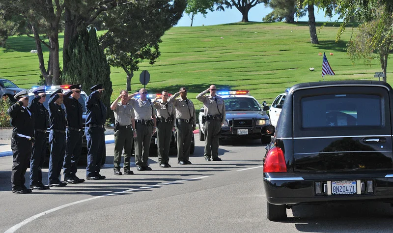  Rancho Palos Verdes, CA --Daily Breeze Staff Photo: Robert Casillas / LANG --- Funeral service for Hawthorne Police Sgt. Leonard Luna at Green Hills Memorial Park in Rancho Palos Verdes.
