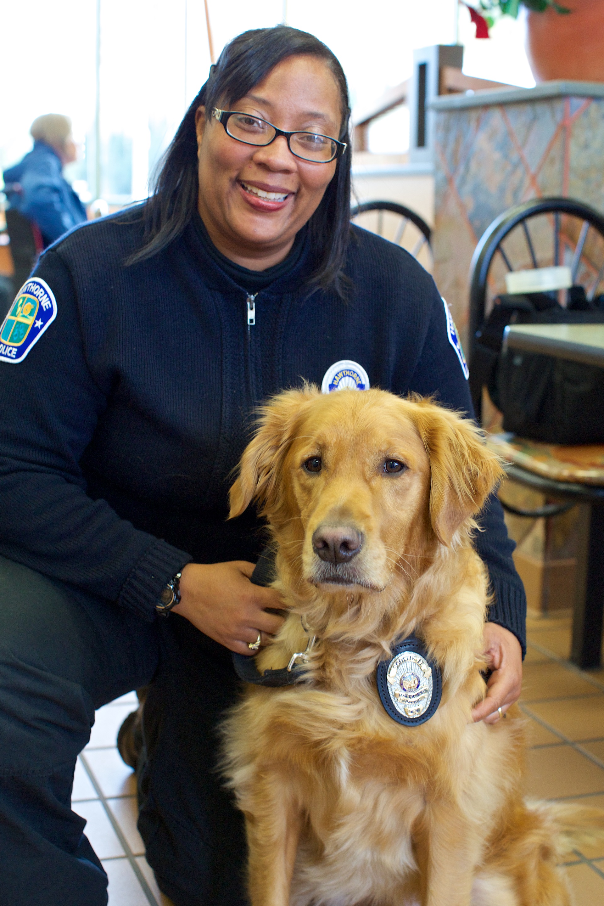HPD Police Service Officer Bell and Scottie. She takes care of Scottie 24/7.