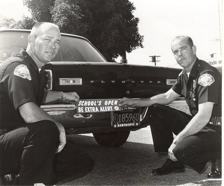 Kenny Stonebraker (left) and Harold Martin (right). The parade photo is from 1976 in front of Chaffee Ford for the annual parade. Photo submitted by Brett Bigelow. 