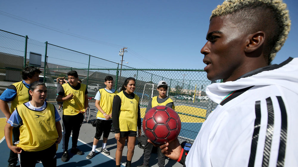   Luis Sinco / Los Angeles Times  Galaxy forward Gyasi Zardes supervises youth futsal games at Hawthorne Memorial Park, where you can find him most Thursdays working with the kids. 