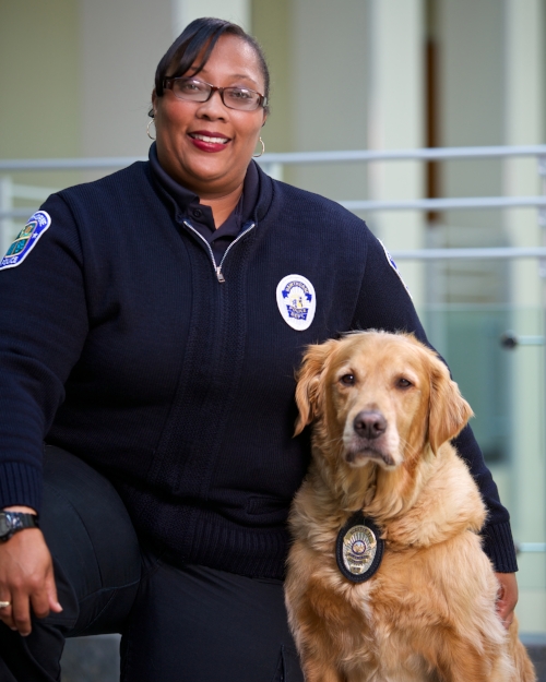 HPD Police Service Officer Bell and Scottie. She takes care of Scottie 24/7. Photo by Erick Chavez