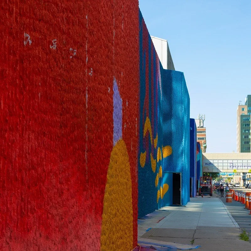 @cassiott &amp; @chucktingley bringing loads of color to Pearl Street! 

Sharing some gorgeous shots of our work in progress downtown at @bfloconvention &mdash; Not a small undertaking. Thank you @eriecountydep for this incredible opportunity to shar