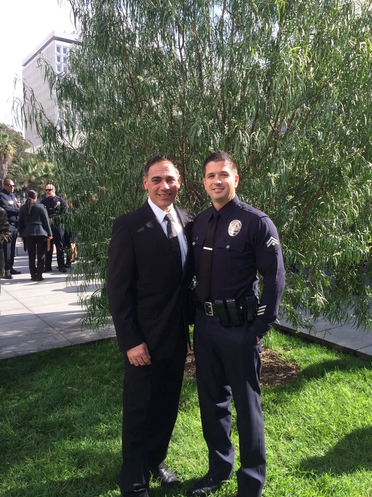 Det. Sam Marullo, in uniform, with Det. Sal LaBarbera
