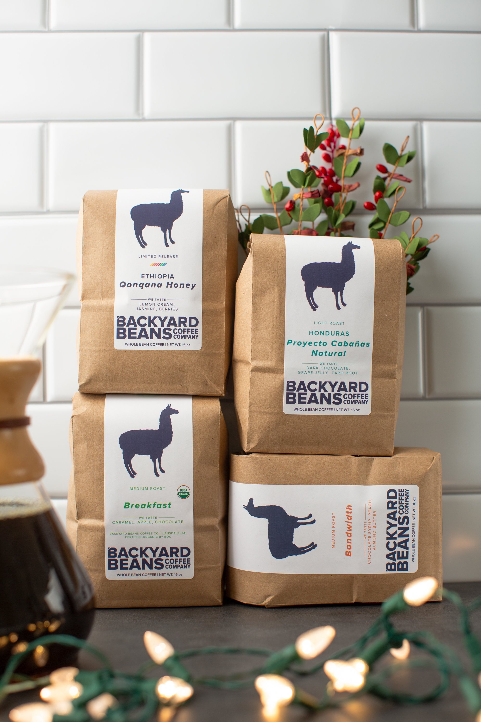 Image of four coffee bags in kitchen.