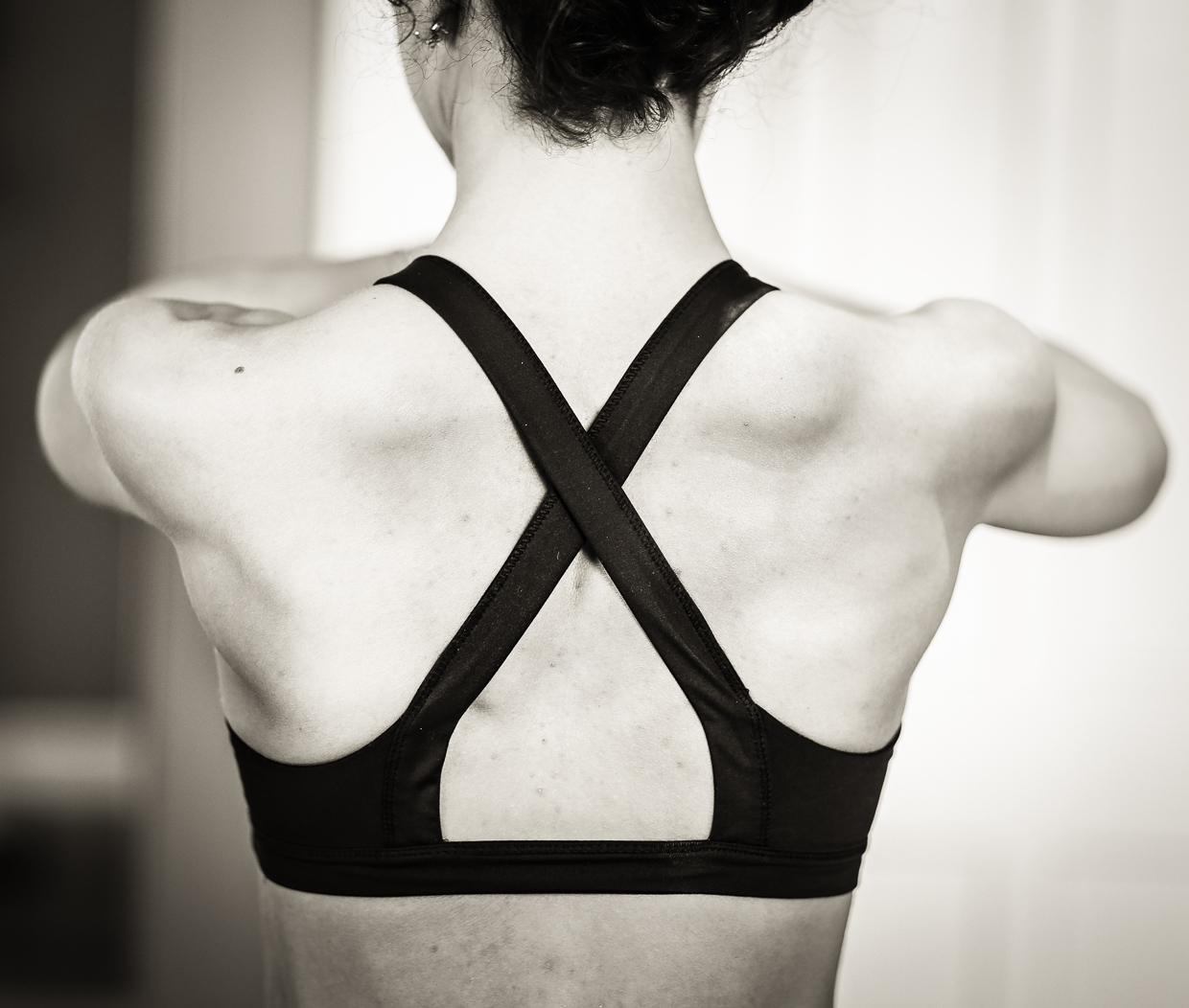 Instructor Erin's beautifully strong back photographed by Ryan Wilson