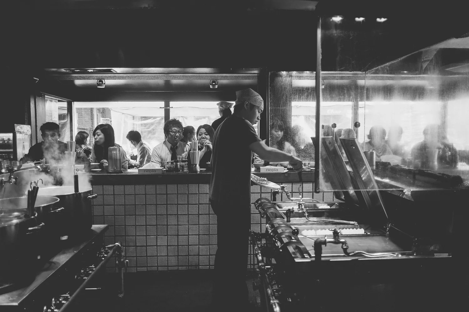 Watching this magician fry our gyoza. I wish you could smell things through a photograph.