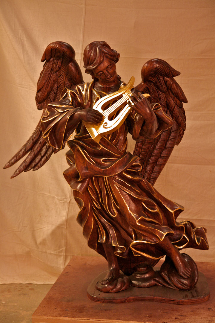  Hand carved angel with lyre. 