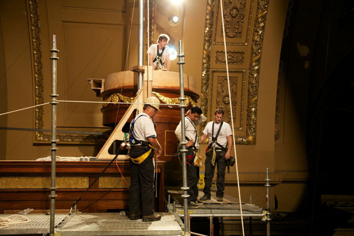 Preparing to lift an upper entablature.