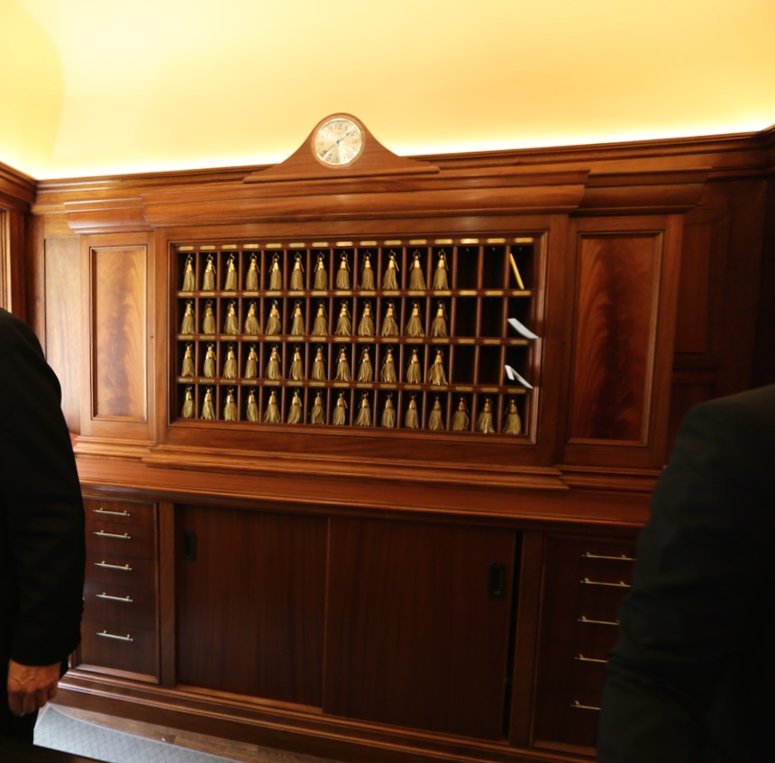 Custom Mahogany clock, credenza, and credenza top with key cubbies.