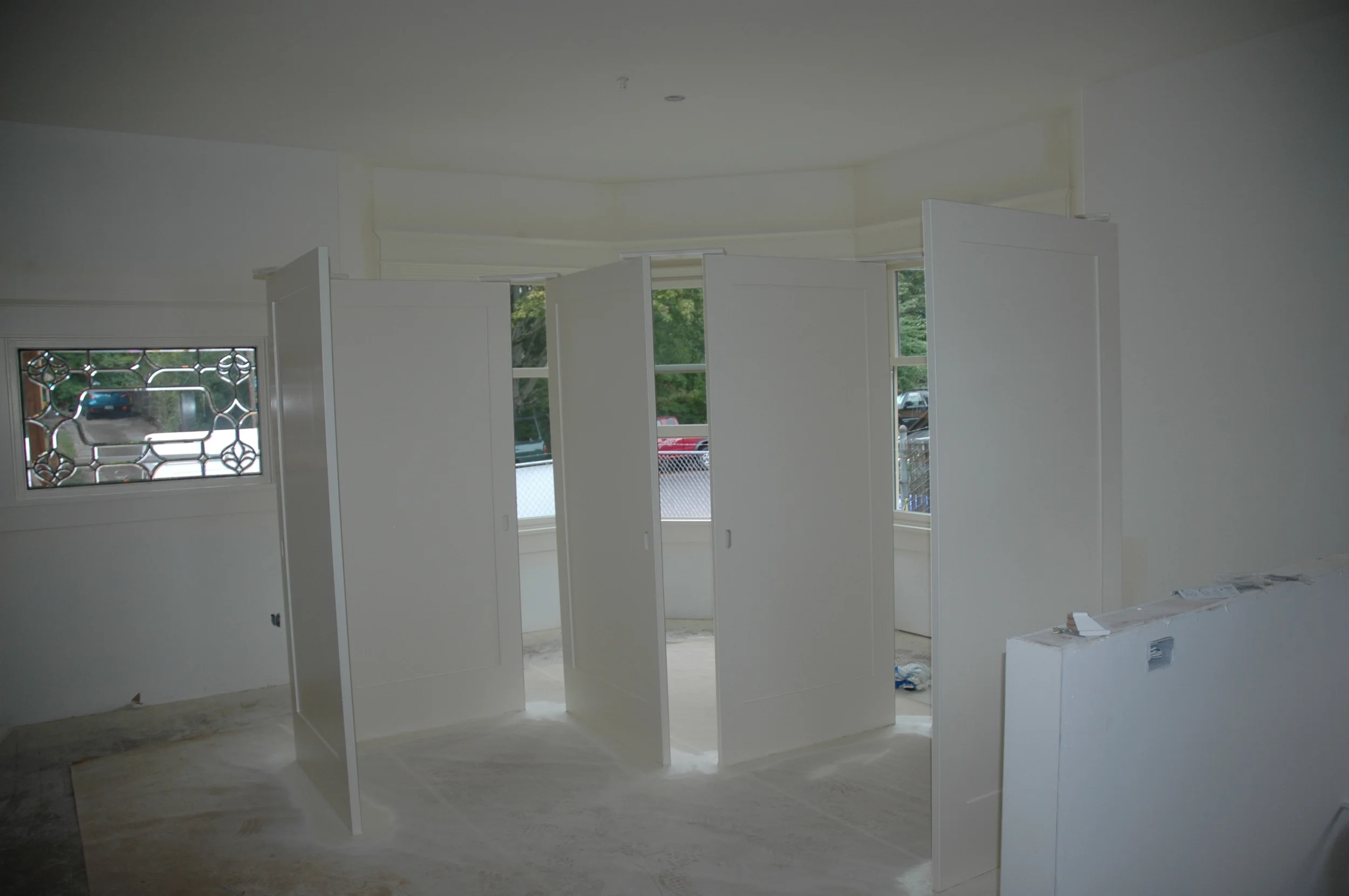 Love the way door paint dries standing up - nailed to a zig-zag of boards