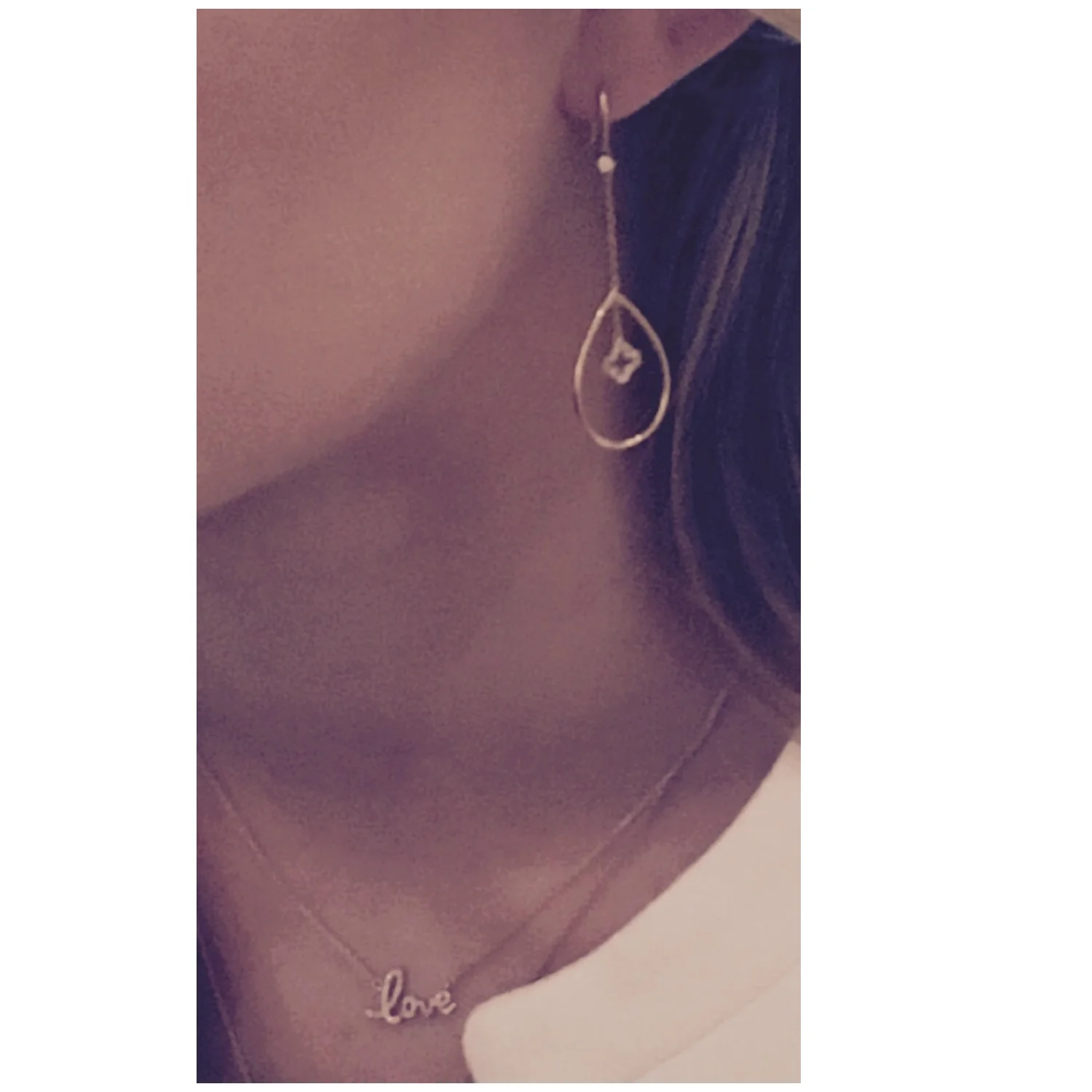 clover drop earring with i phone .jpg