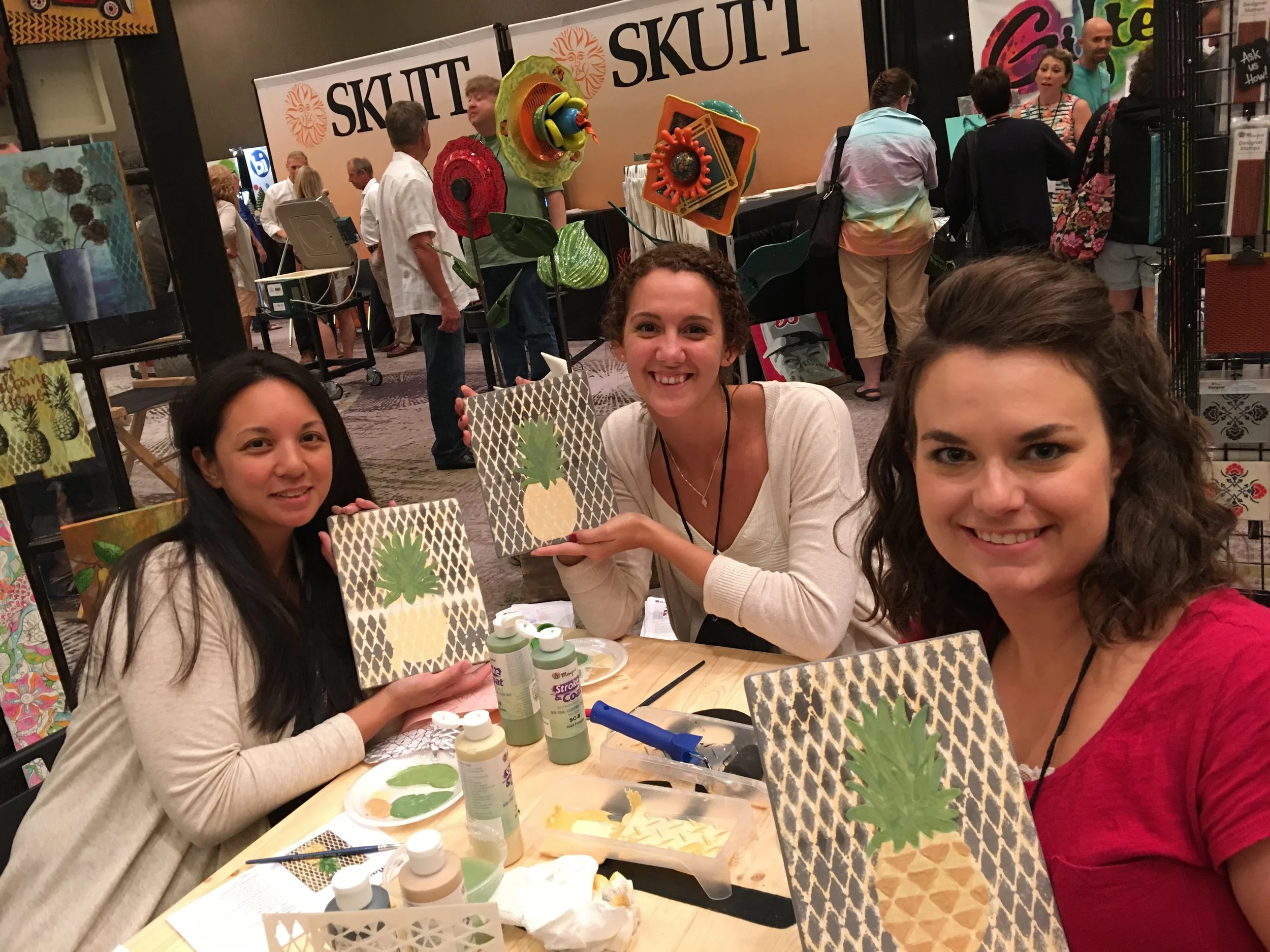 Allie making clip boards with new studio friends.