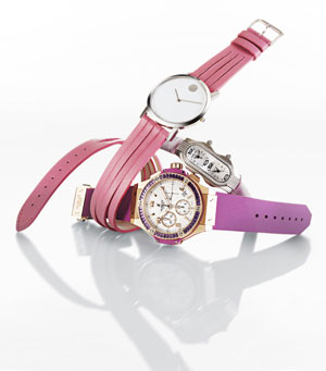 Sweet Tock | A fresh crop of watches catches the wave of the fuchsia. Once reserved for Swatch-wearing teens circa 1985, splashy pink and purple watches can now be spotted on posh and sporty adult wrists too. Movado sweetens its double-wrap offering with a sliced band in bubblegum pink. Ideal for the fun-loving gal on the go, the scored leather strap adds a youthful twist to the house’s spare signature dial. Hublot and Philip Stein prefer to juxtapose extravagance with practicality. The former sets a milky face encircled by rectangular amethysts against a sturdy rubber band topped with chunky gold bits. The latter couples satin and diamonds in a slim and trim evening timepiece that features dual time zones. Now that’s two-timing of the best kind. From top: Movado’s stainless steel watch,Philip Stein’s stainless steel and diamond watch, Hublot’s 18k red gold and amethyst watch.