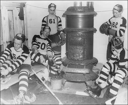 Solomon and team-mates lacing up their hockey-boots
