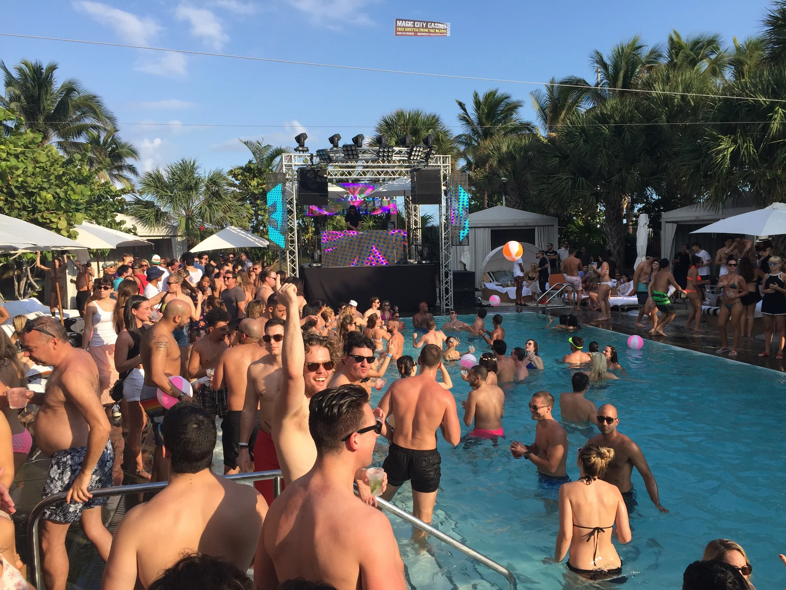 Please note the airplane-towed-billboard. You say 'empty sky' I say 'wasted advertising opportunity'. Next, we will put something on that bro's back.